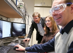 From left, Andrei Kholkin, University of Aveiro; Sabine Neumayer, University College Dublin; and ORNL?s Evgheny Strelcov look over data collected during a workshop experiment. Photo by Jason Richards.