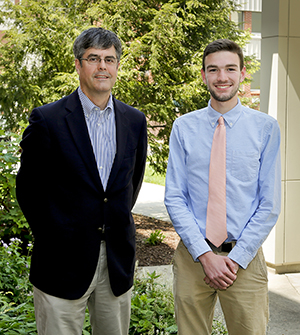 ORNL Director Thom Mason congratulates UT-Battelle scholarship recipient Samuel Feldman. Photo: Jason Richards