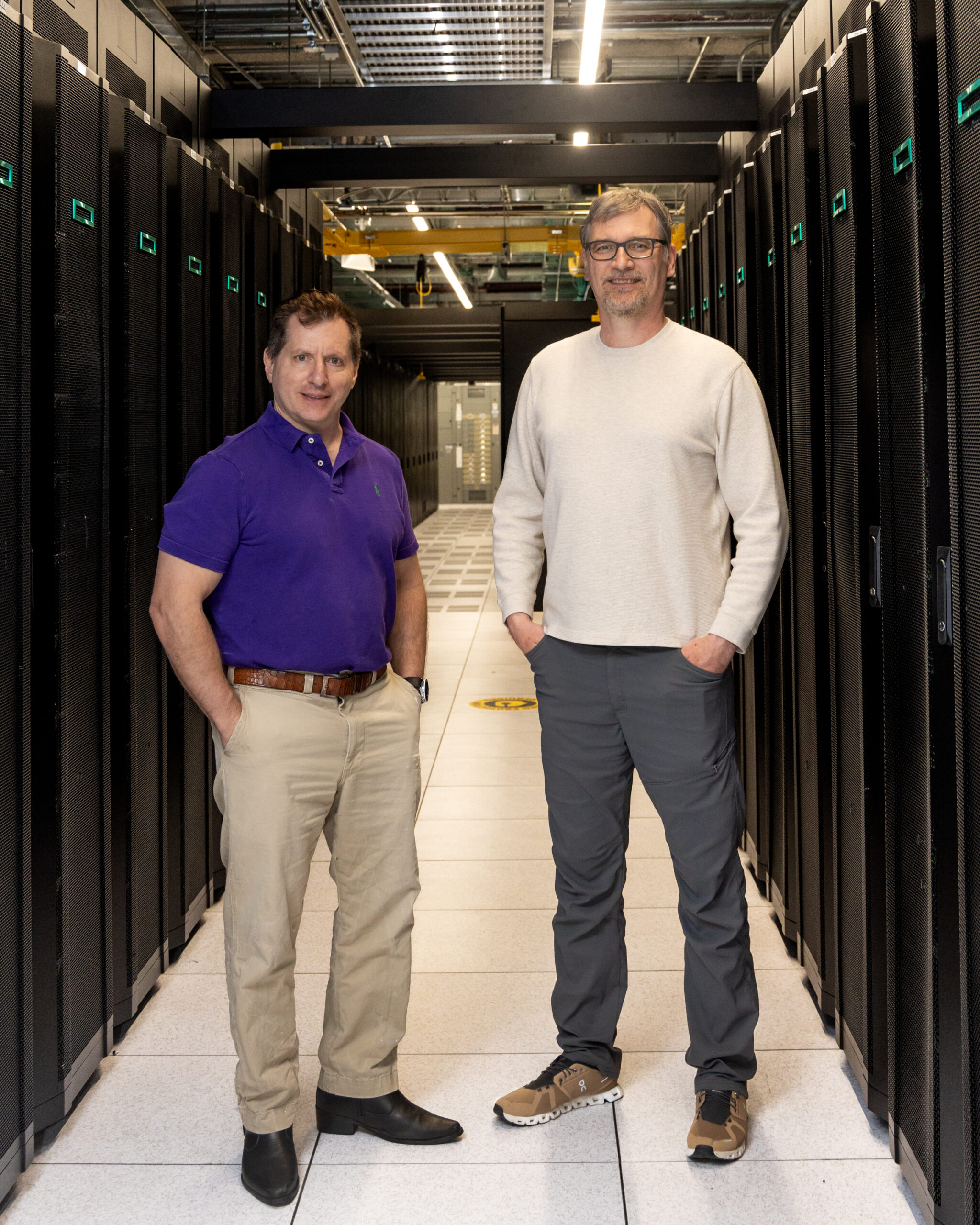 Architects of the Adaptable IO System, seen here with Frontier's Orion file system: Scott Klasky, left, heads the ADIOS project and leads ORNL's Workflow Systems group, and Norbert Podhorszki, an ORNL computer scientist, oversees ADIOS's continuing development.
