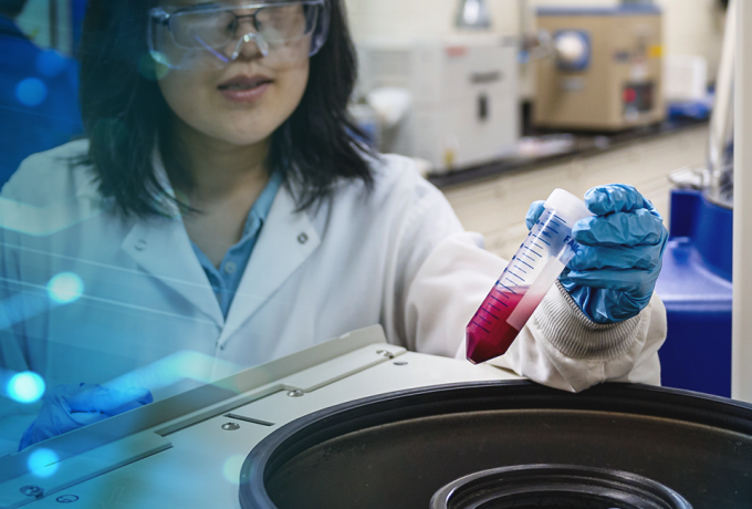 scientist working with a sample in a lab