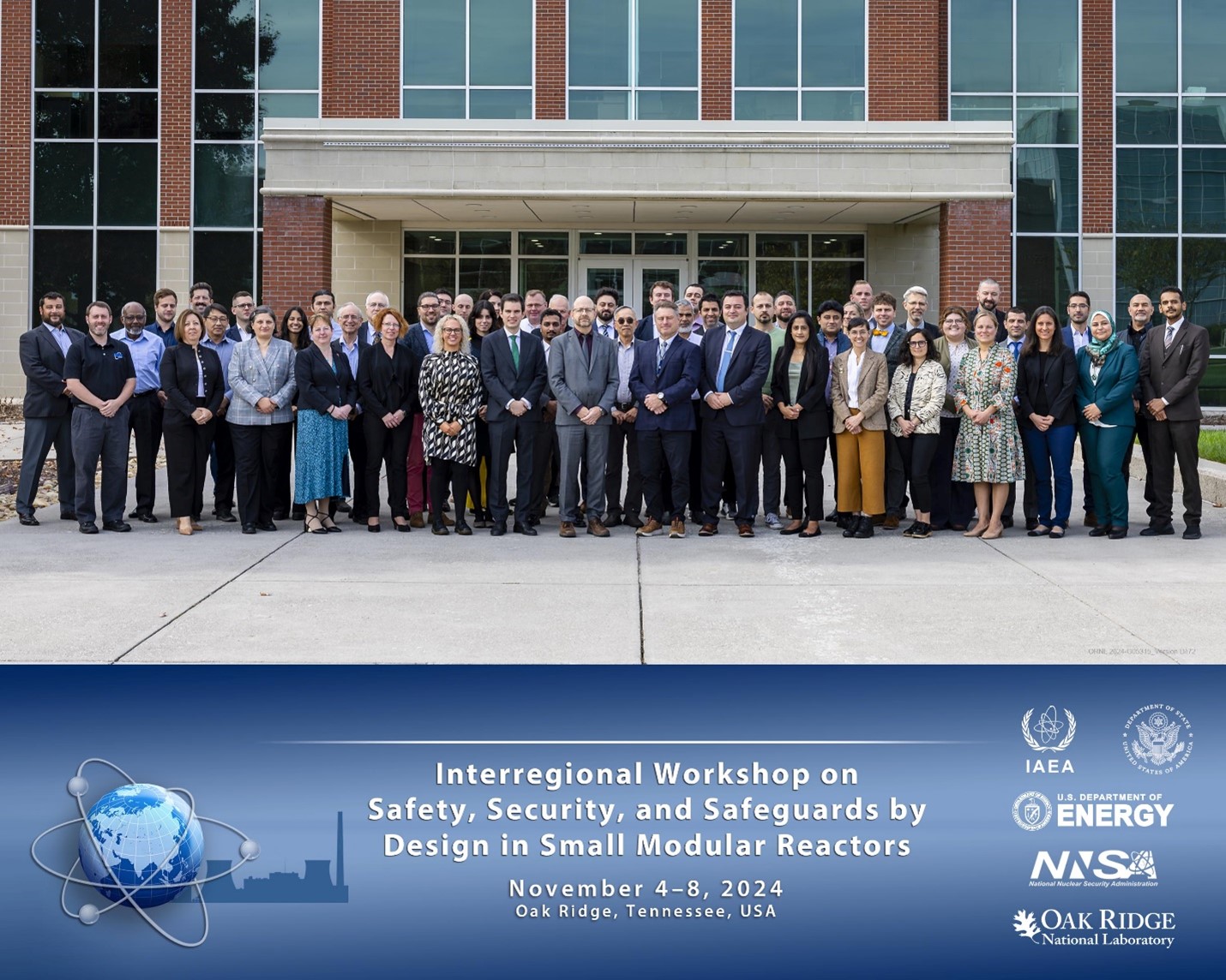 Big group photo standing outside of a brick building with text underneath describing the IAEA workshop on safety, security and safeguards
