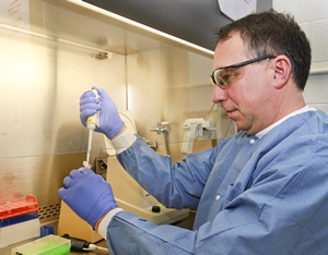 Oak Ridge National Laboratory's Mircea Podar and colleagues envision their discovery profiling the SR1 bacteria providing a path toward a better understanding of microbiological factors of periodontitis. ORNL photo/Jason Richards
