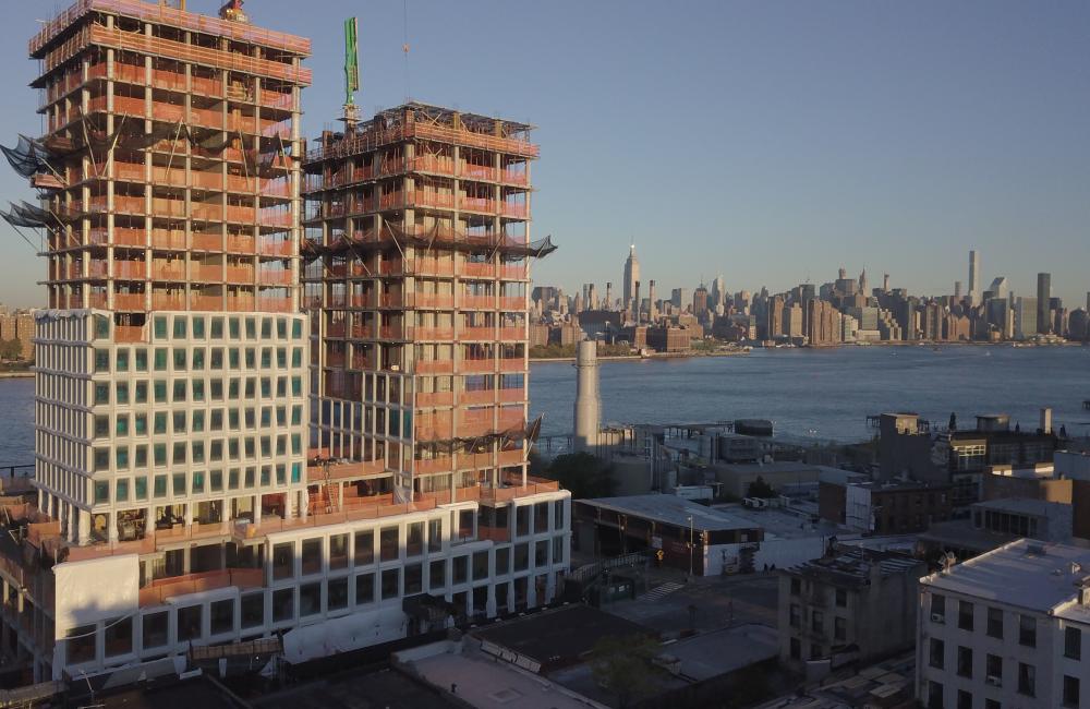 A multi-story building is constructed using 3-d printing capabilities developed through Oak Ridge National Laboratory.