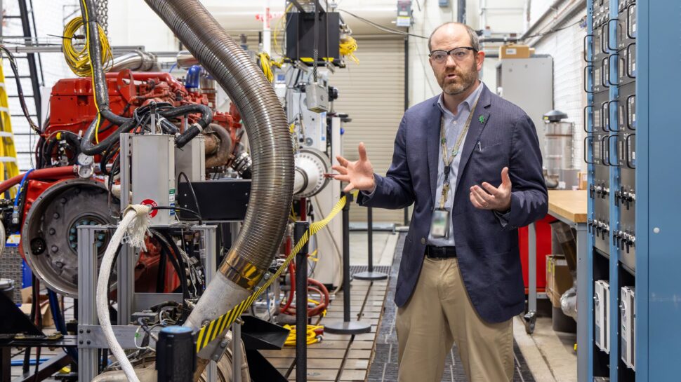 Scott Curran, Group Leader, RPD Fuel Science & Engine Technologies, leads a tour of the Fuel Science & Engine Technologies laboratories, highlighting advanced engine research and testing capabilities during the ESTD Directorate Advisory Committee visit.