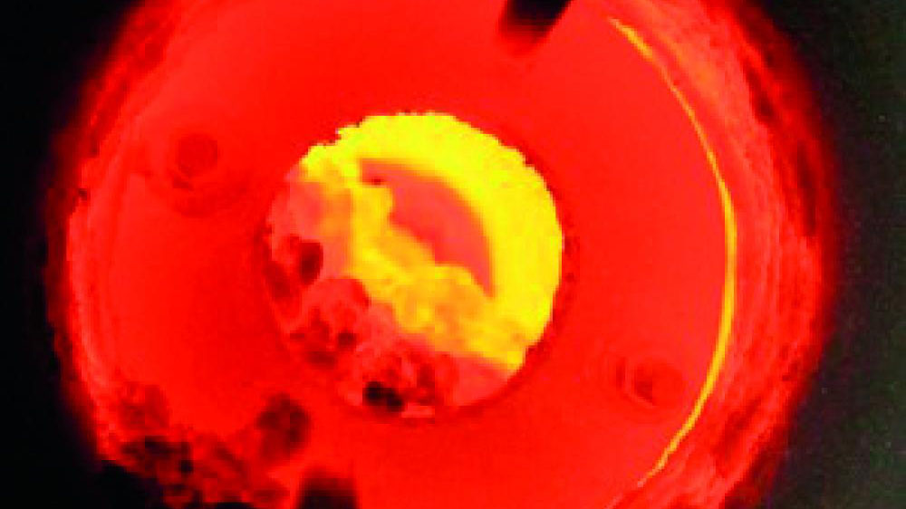 A thermal conversion line glows with heat.