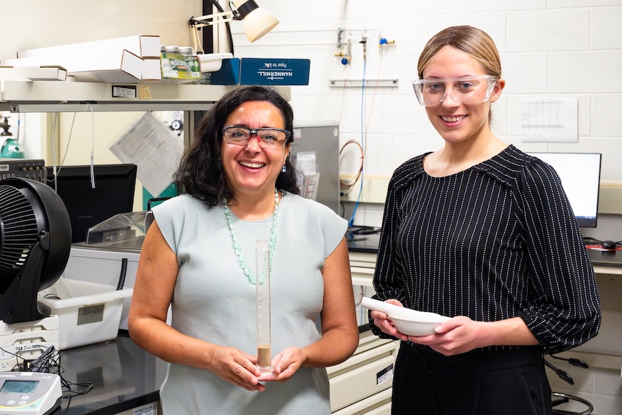 Fernanda Santos, mentor, left, and Greta Franke, mentee, conduct soil research in Room 307 of Building 1505 at Oak Ridge National Laboratory on Tuesday, July 28, 2026.