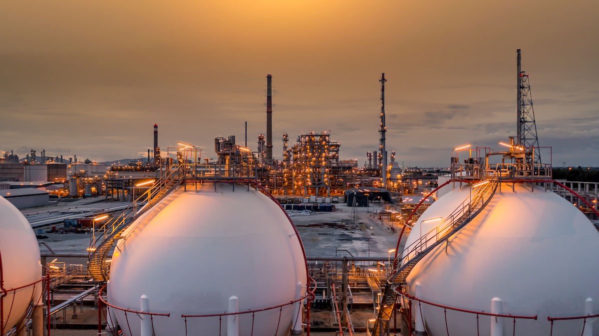 Gas storage sphere tank in petrochemical industry zone with oil and gas refinery factory plant. Image from Envato