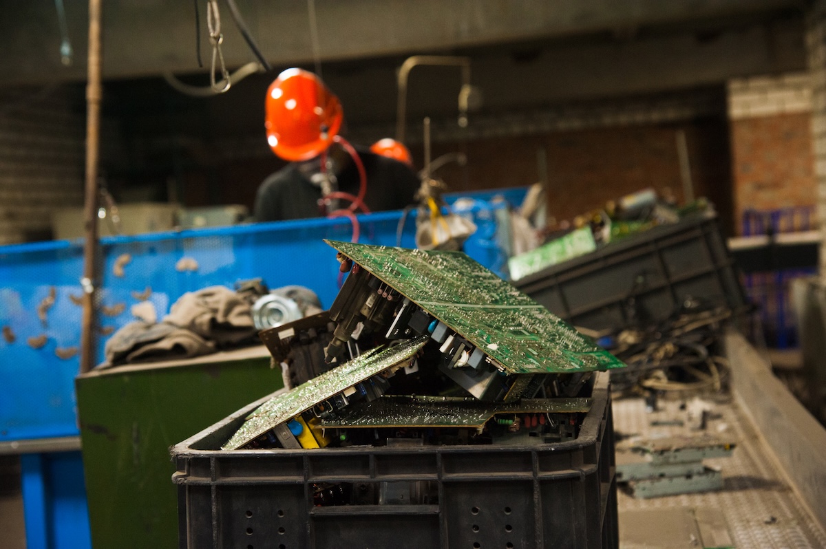 Electronic waste recovery at an industrial site. Image from Envato.