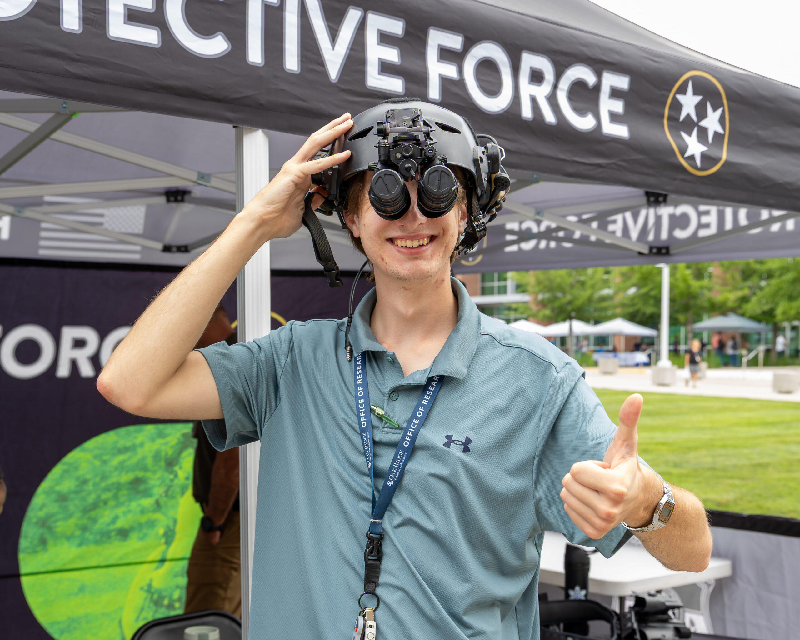 Nathan Sutherland, an intern, wears a night vision system during a Protective Force demonstration at ORNL Safety Week.