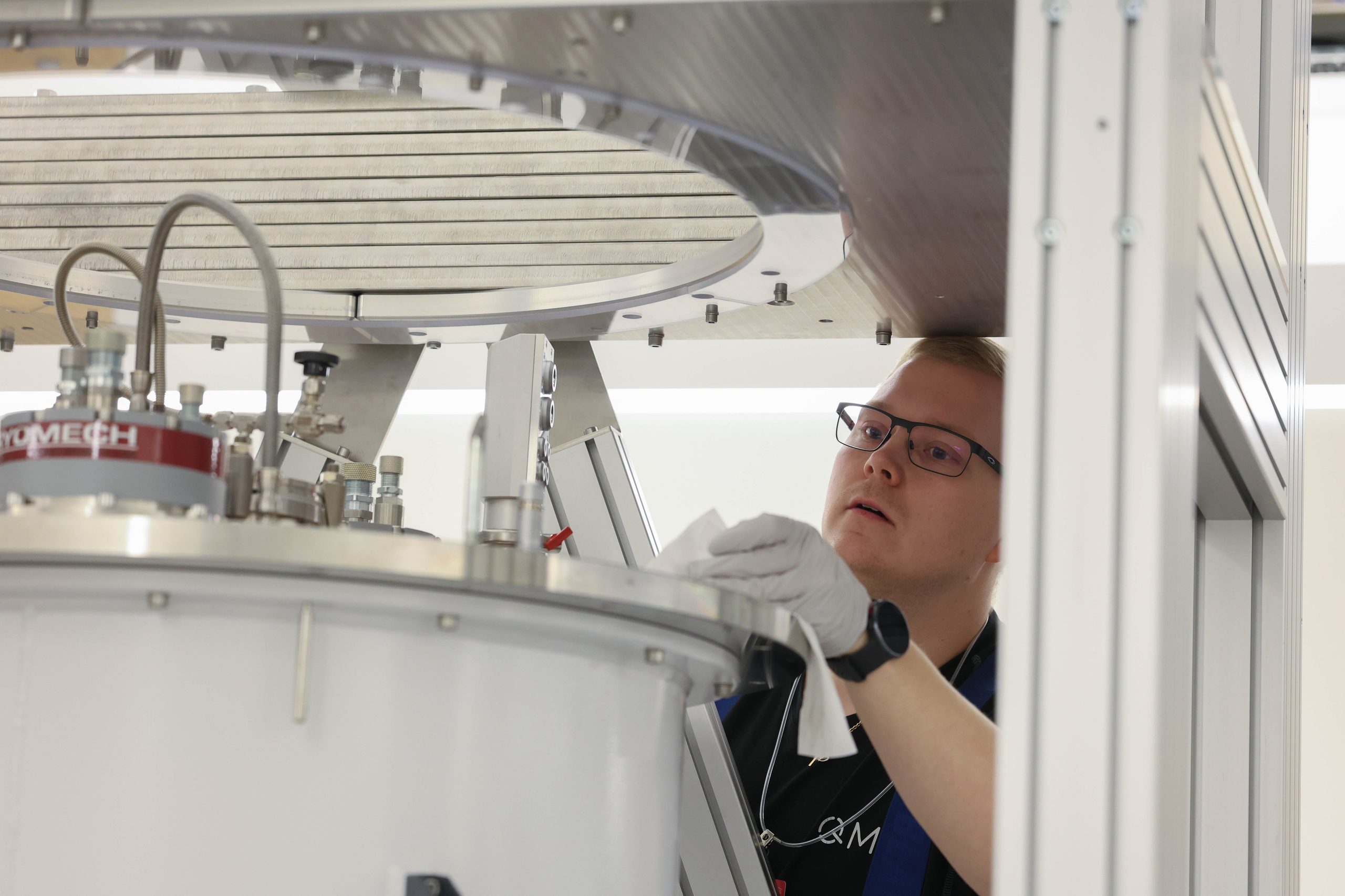 Technicians install a new quantum computer.