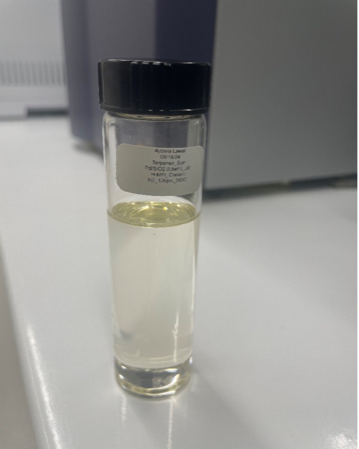 Vial containing jet fuel produced from waste terpenes.