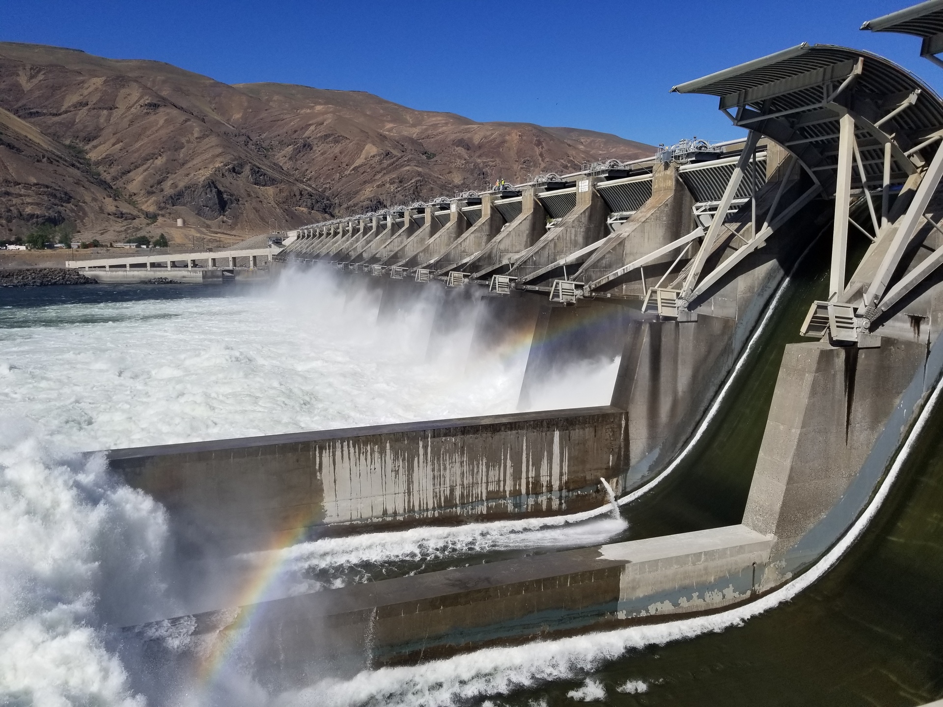 Hydroelectric dam releasing water into the Columbia River in Washington.